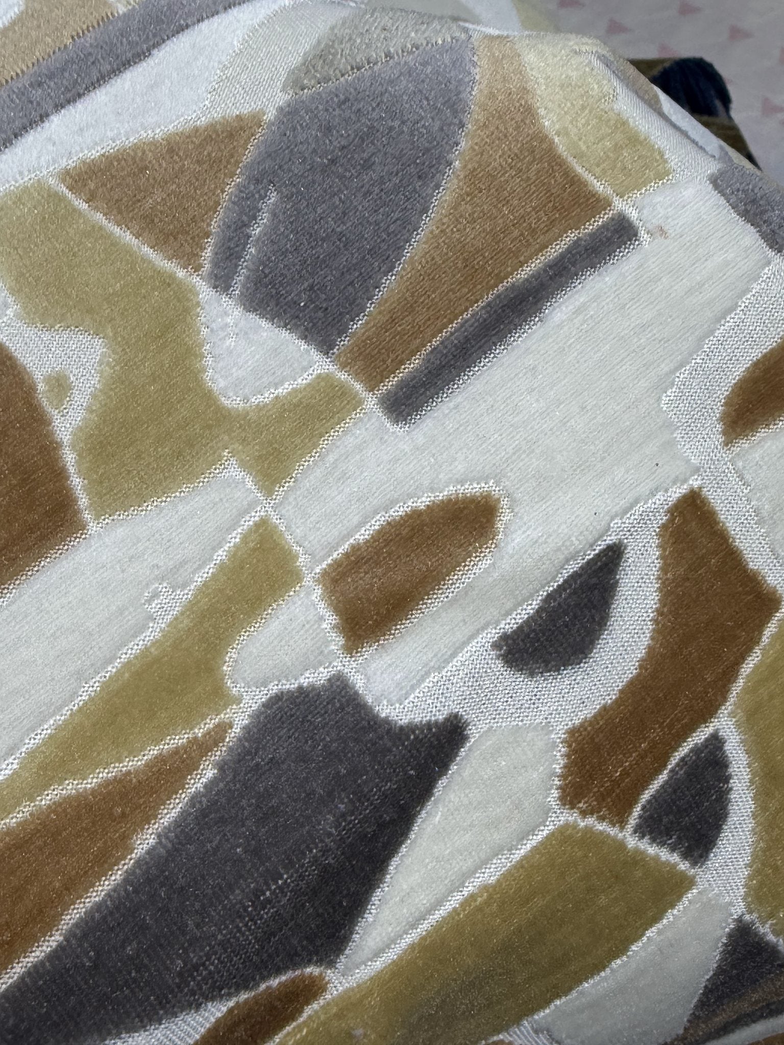 Earth-tone geometric cut velvet jacquard fabric face, mosaic motif
