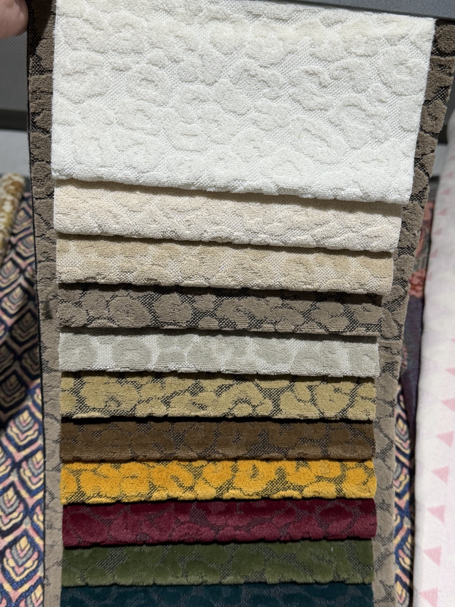 Full color-card stack of animal-spot cut velvet jacquard
