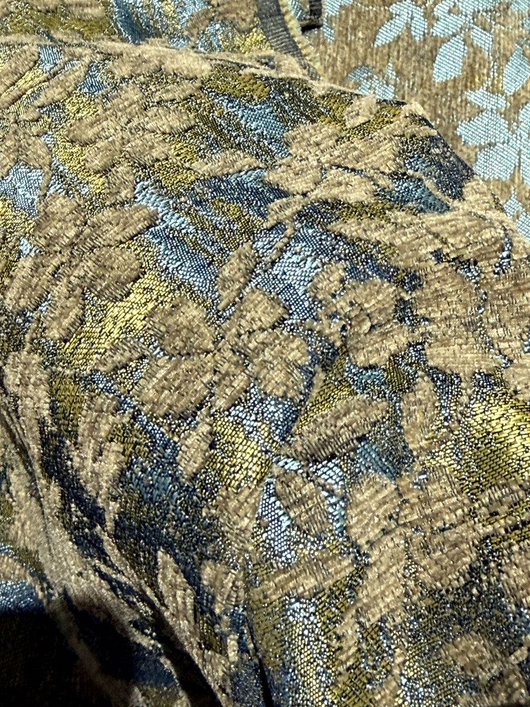Mid-century chenille jacquard fabric drape showing pile texture and metallic ground