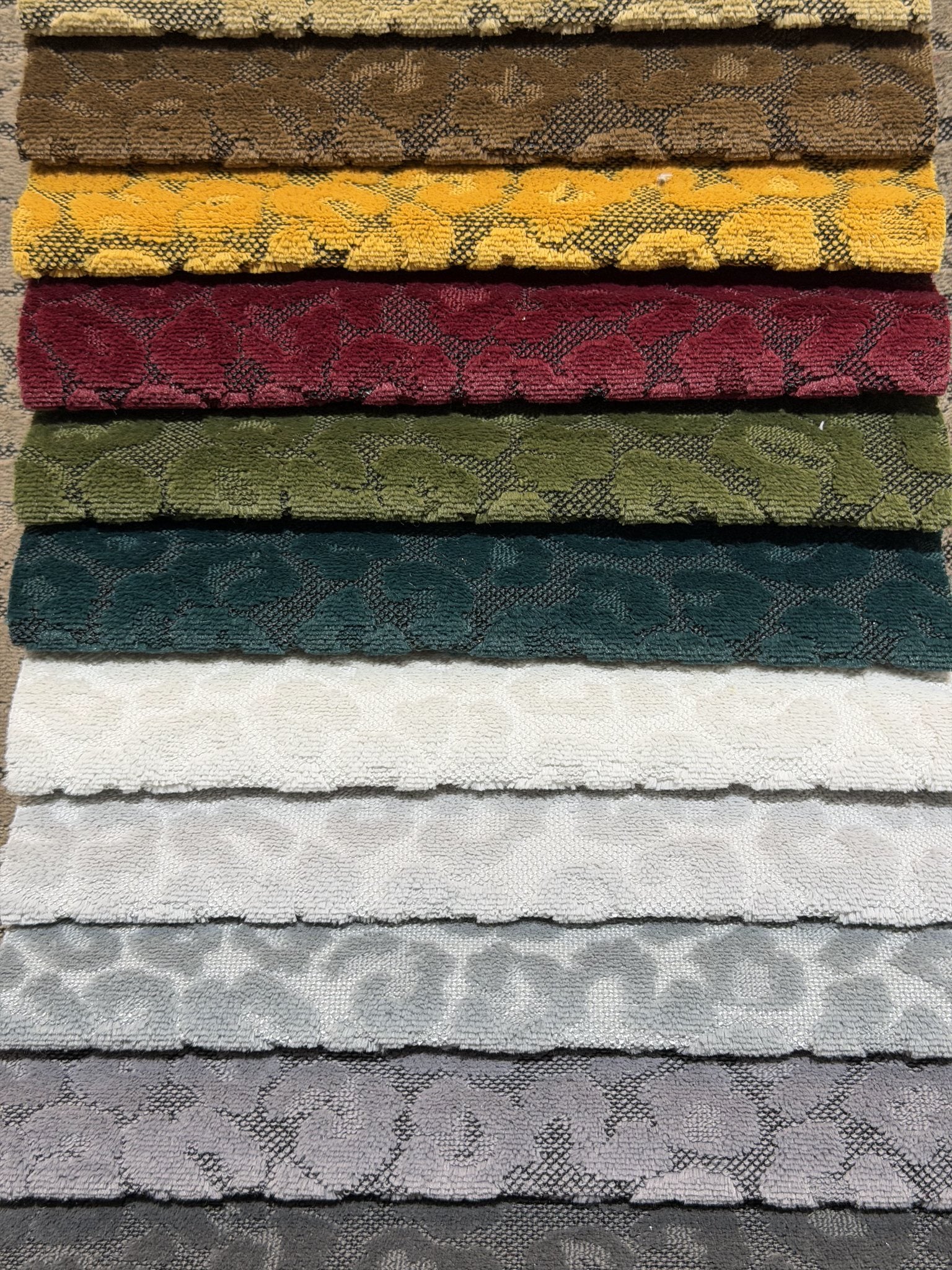 Deep colorways of animal-spot cut velvet jacquard